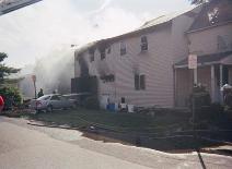 Firefighters use water to ventilate the property because of the heavy smoke